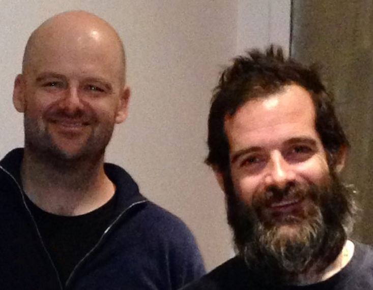 Rockstar co-founders Dan Houser and Sam Houser smiling side by side